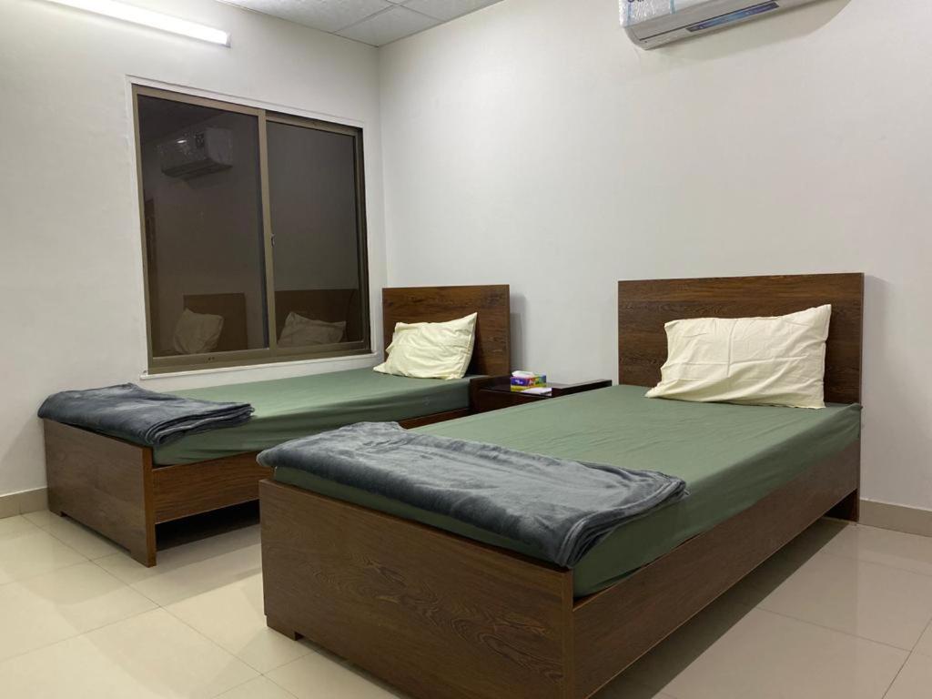 • Faizi Furnished Apartments Faisalabad Esterno foto